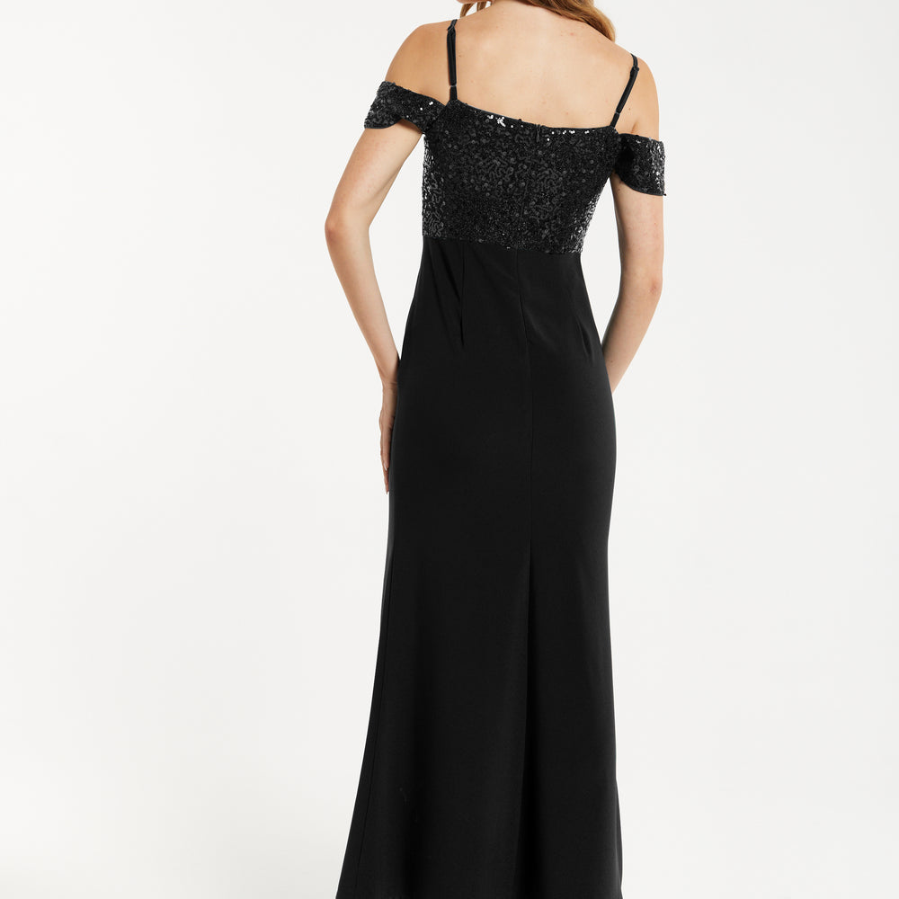 
                  
                    Liquorish Women's Maxi Dress in Black with Off-Shoulder Design, Thigh-High Slit & Sequin Detail
                  
                