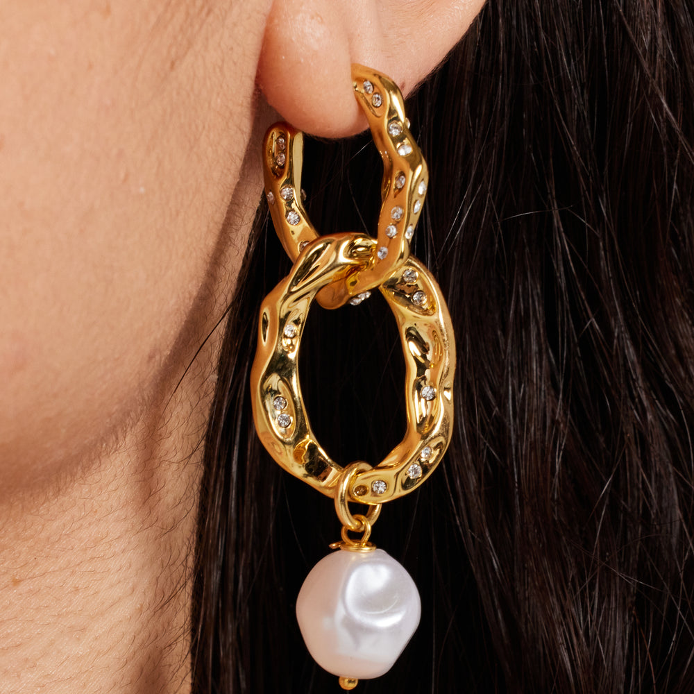 
                  
                    Gold Pearl Drop Earrings
                  
                