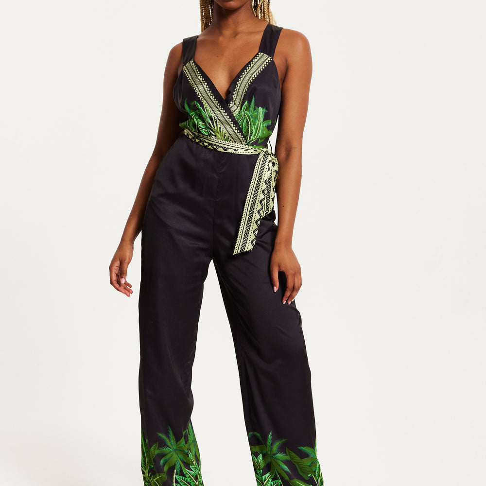 
                  
                    Liquorish Leaf Printed V-neck Jumpsuit With Tie Detail
                  
                