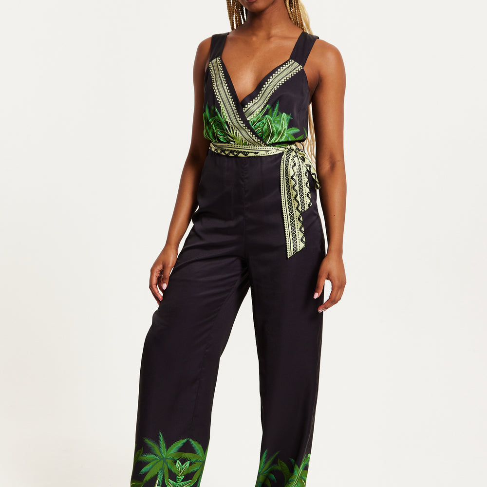 
                  
                    Liquorish Leaf Printed V-neck Jumpsuit With Tie Detail
                  
                