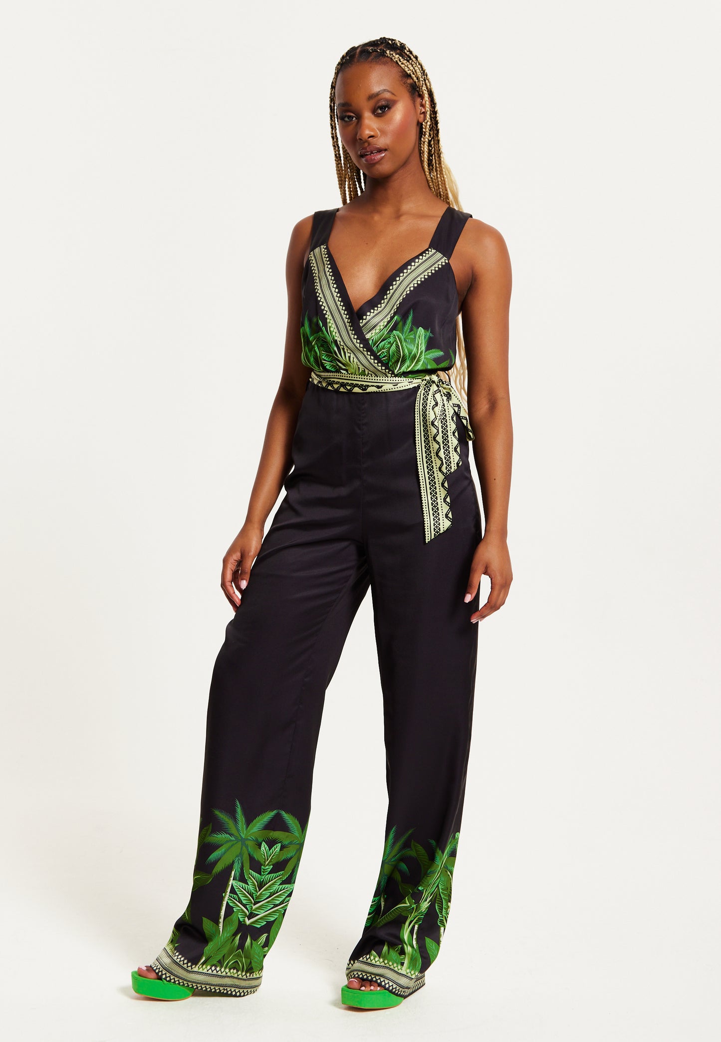 
                  
                    Liquorish Leaf Printed V-neck Jumpsuit With Tie Detail
                  
                