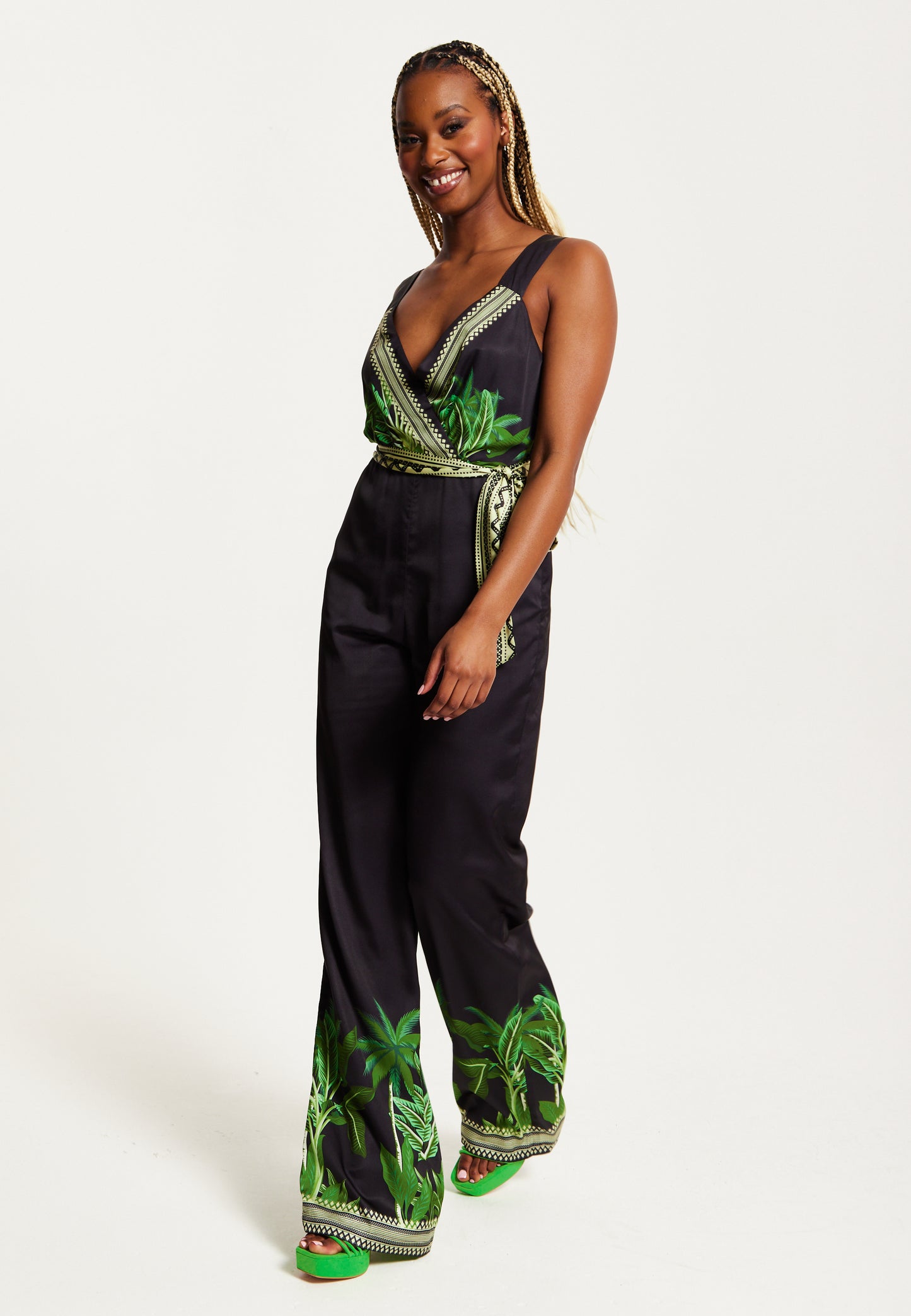 
                  
                    Liquorish Leaf Printed V-neck Jumpsuit With Tie Detail
                  
                