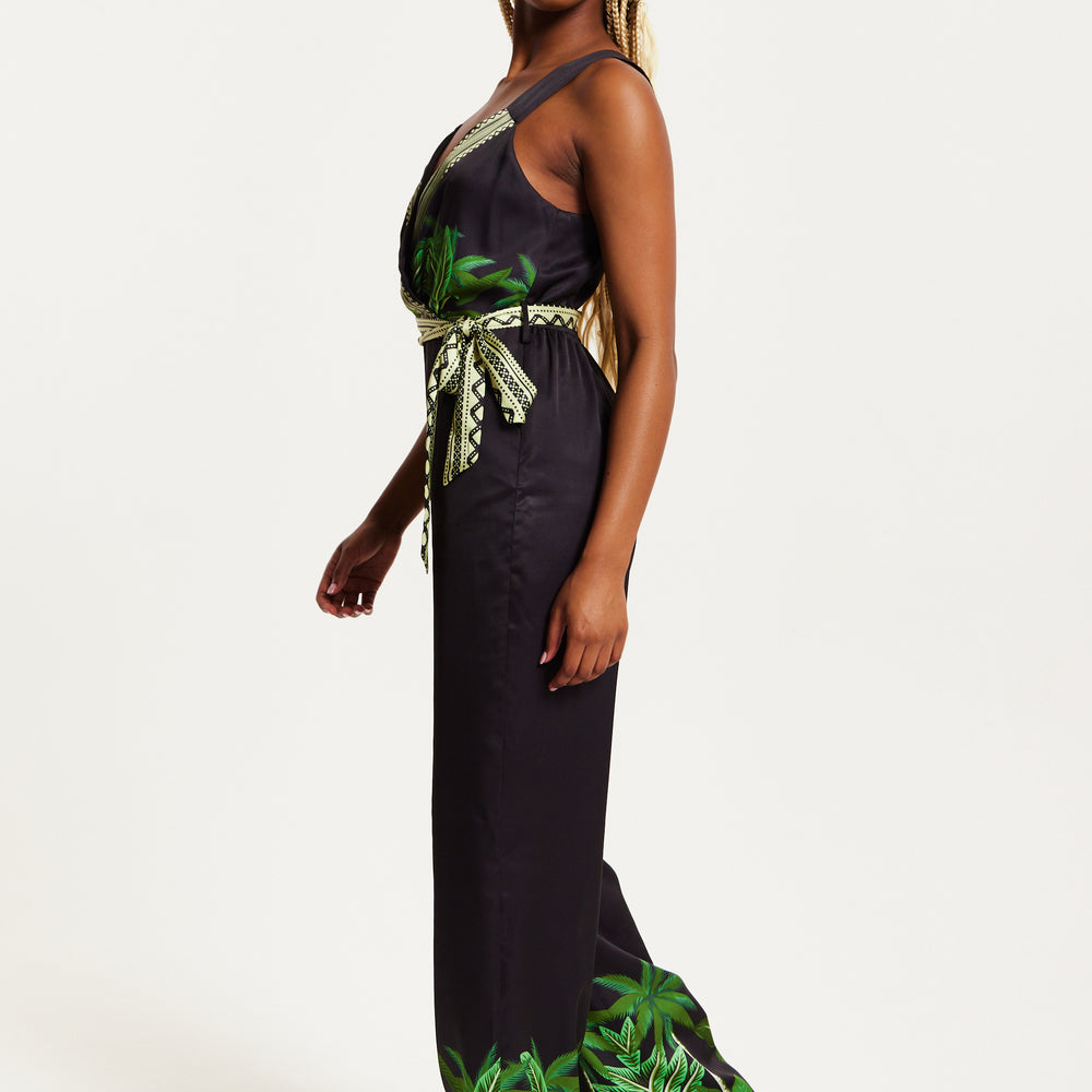 
                  
                    Liquorish Leaf Printed V-neck Jumpsuit With Tie Detail
                  
                