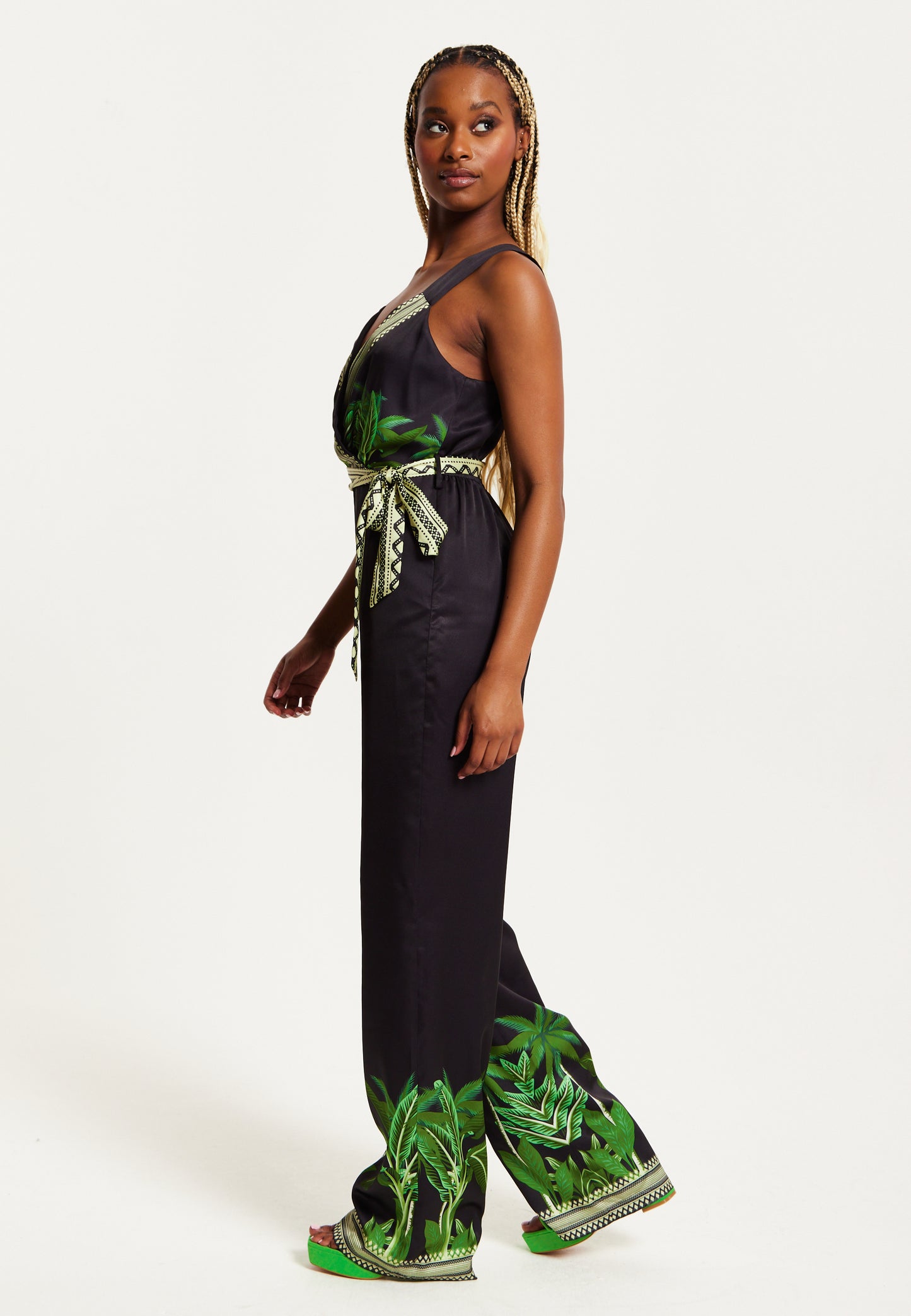 
                  
                    Liquorish Leaf Printed V-neck Jumpsuit With Tie Detail
                  
                