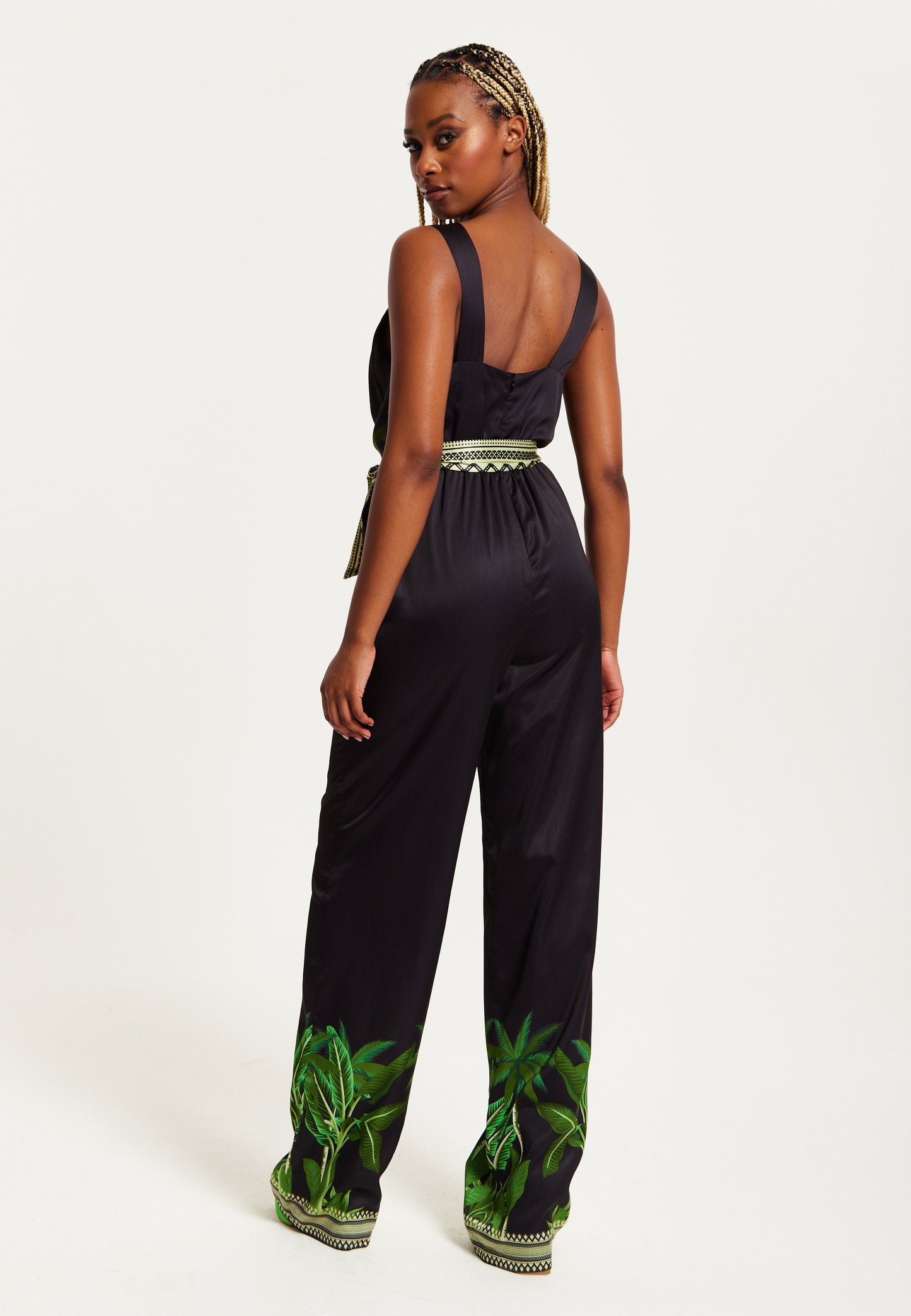 
                  
                    Liquorish Leaf Printed V-neck Jumpsuit With Tie Detail
                  
                