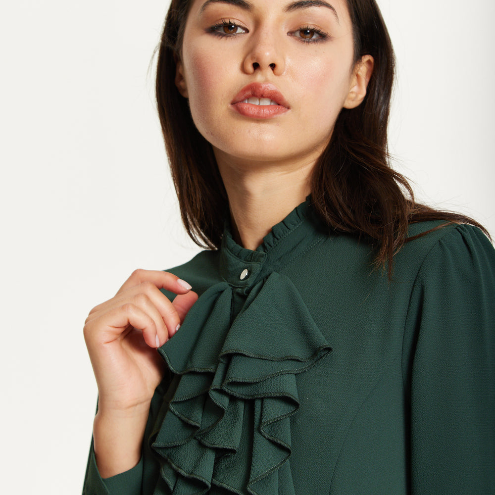 
                  
                    Green Ruffle Front Long Sleeve Blouse
                  
                