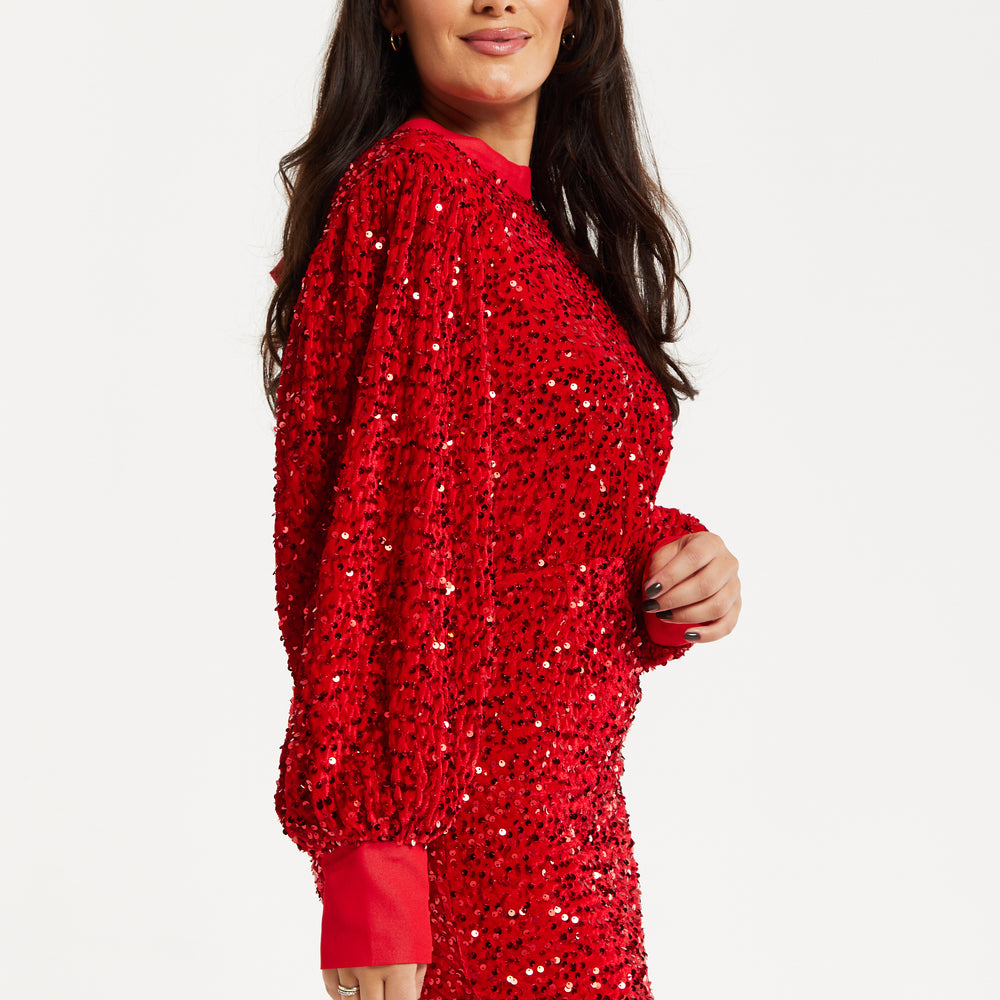 
                  
                    Women's Mini Dress in Red Velvet with Long Sleeves, High Neck, Open Back & Tie Detail - Liquorish
                  
                