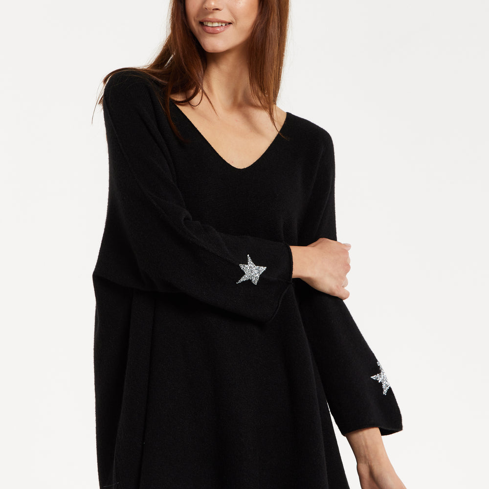 
                  
                    Liquorish Women's Black V-Neck Jumper with Star Embellishments and Long Sleeves
                  
                