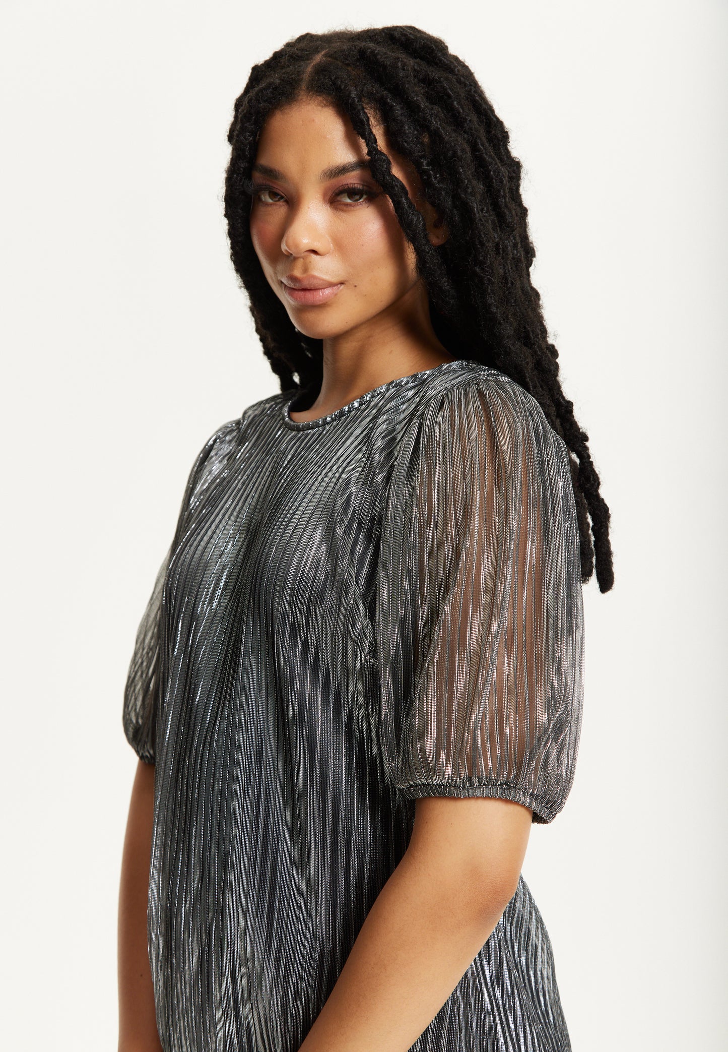 
                  
                    Metallic Pleated Puff Sleeve Top
                  
                