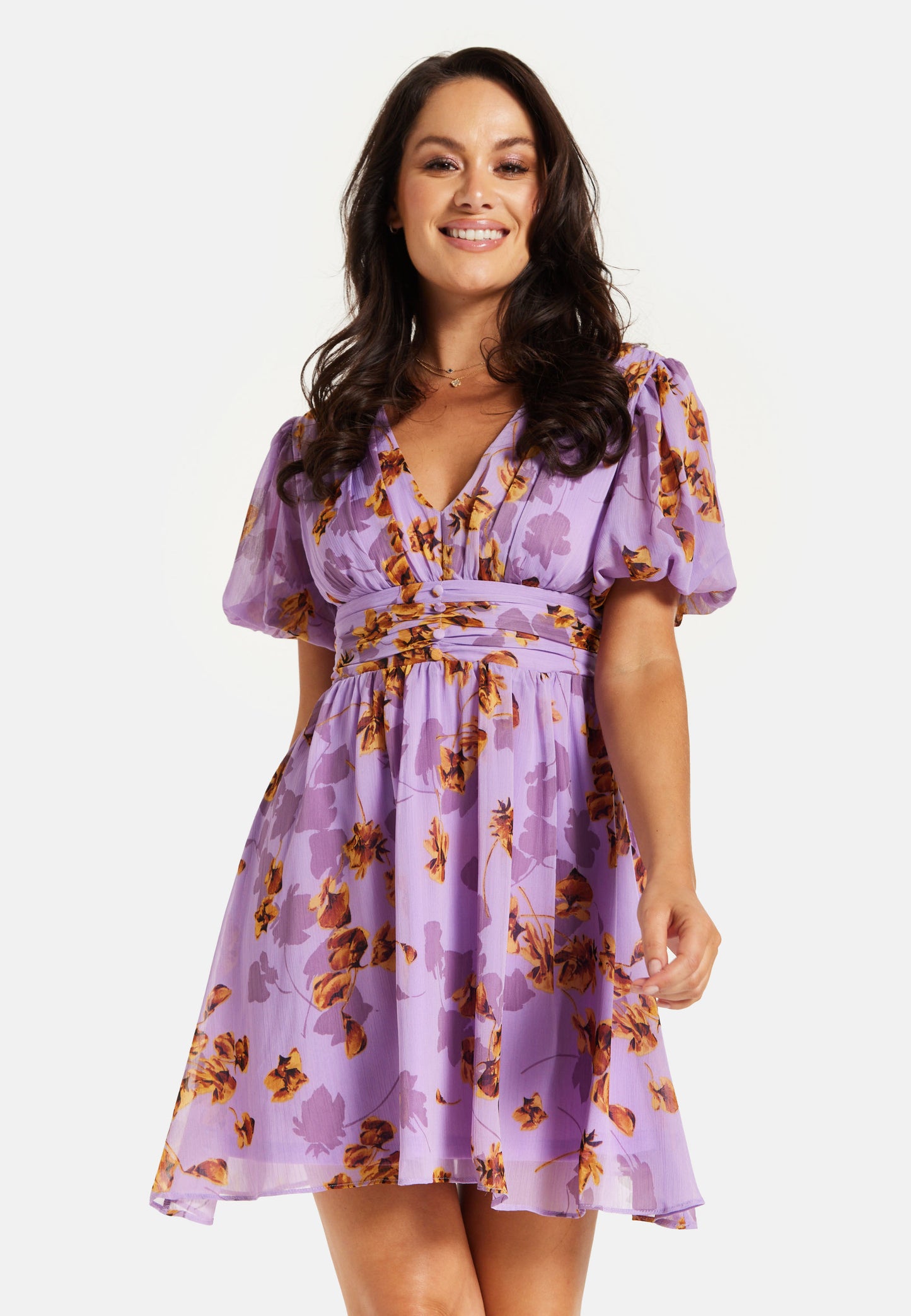 
                  
                    Women's Mini Dress in Purple Floral with Short Sleeves and Deep V Neck - Stylish Button Waistband by Liquorish
                  
                