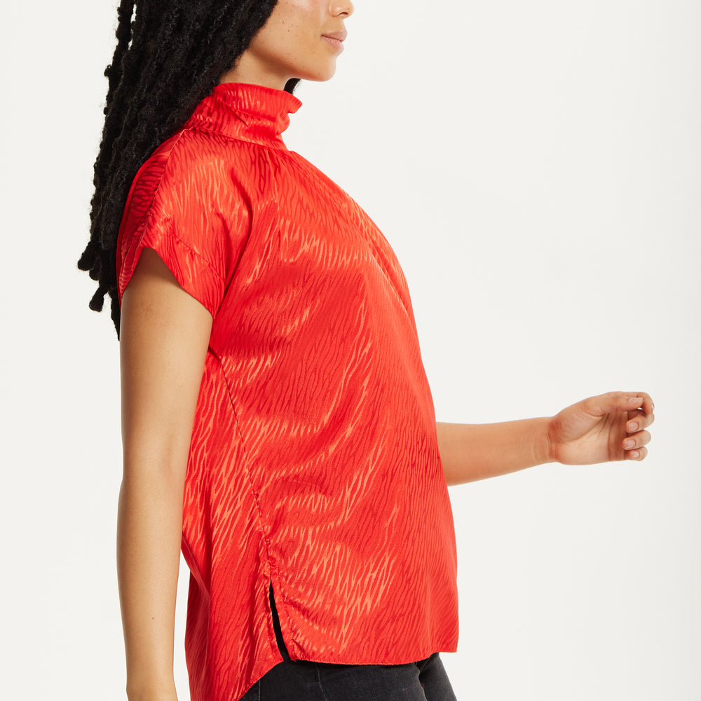 
                  
                    Red Satin Textured High Neck Top
                  
                