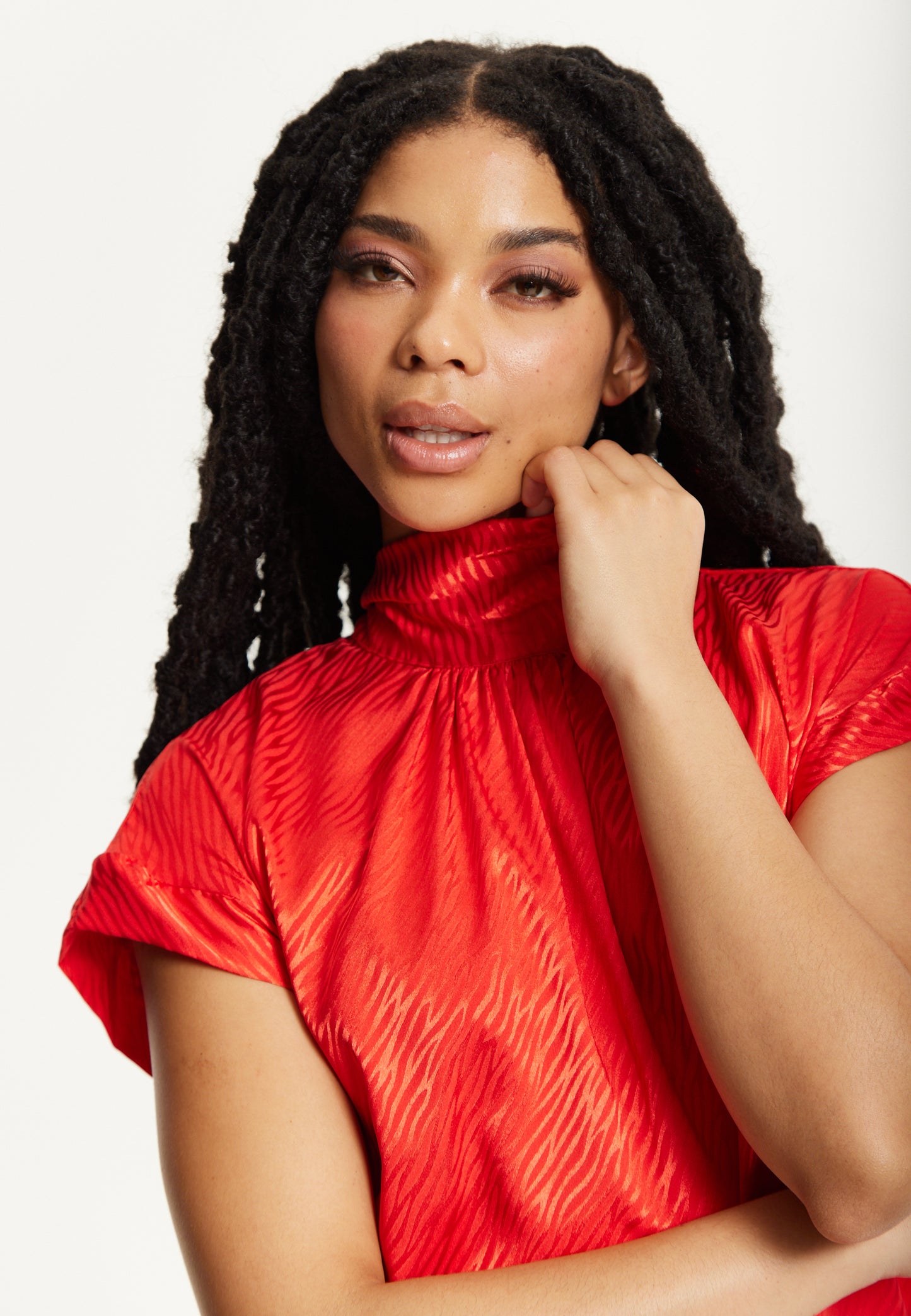 
                  
                    Red Satin Textured High Neck Top
                  
                