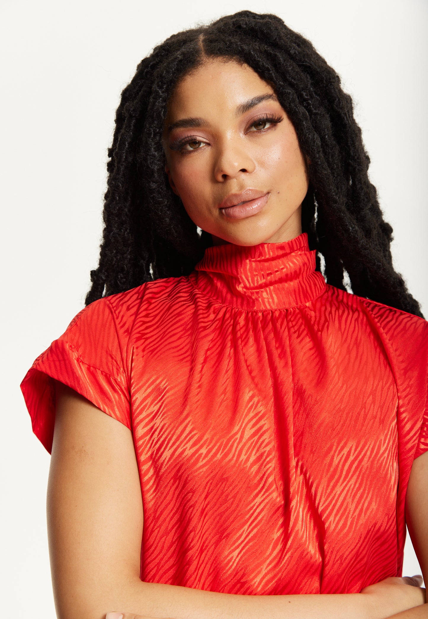 
                  
                    Red Satin Textured High Neck Top
                  
                