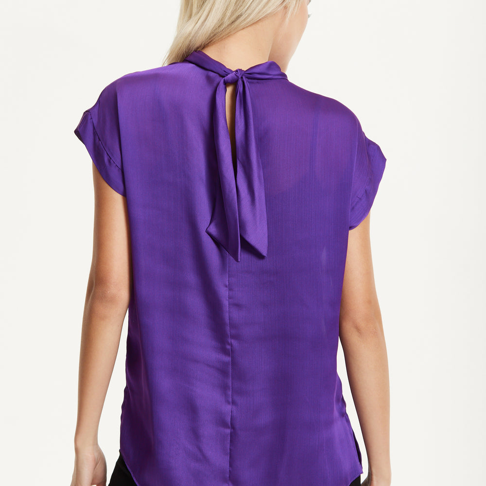
                  
                    Satin Purple Tie Back Blouse
                  
                