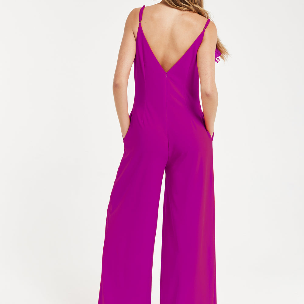 
                  
                    Liquorish Elegant Fuchsia Jumpsuit with Floral Shoulder Detail
                  
                