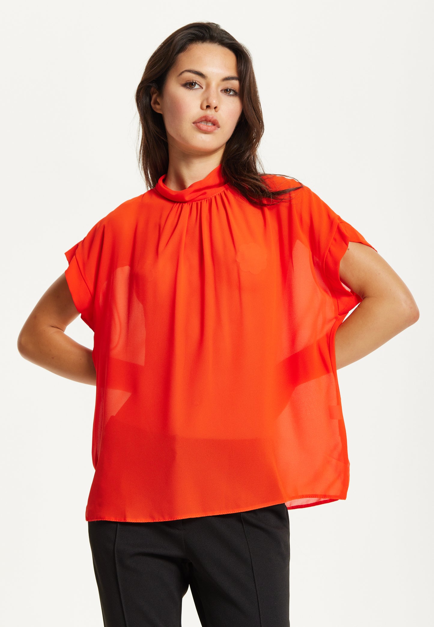 
                  
                    Orange High Neck Tie Back Top
                  
                