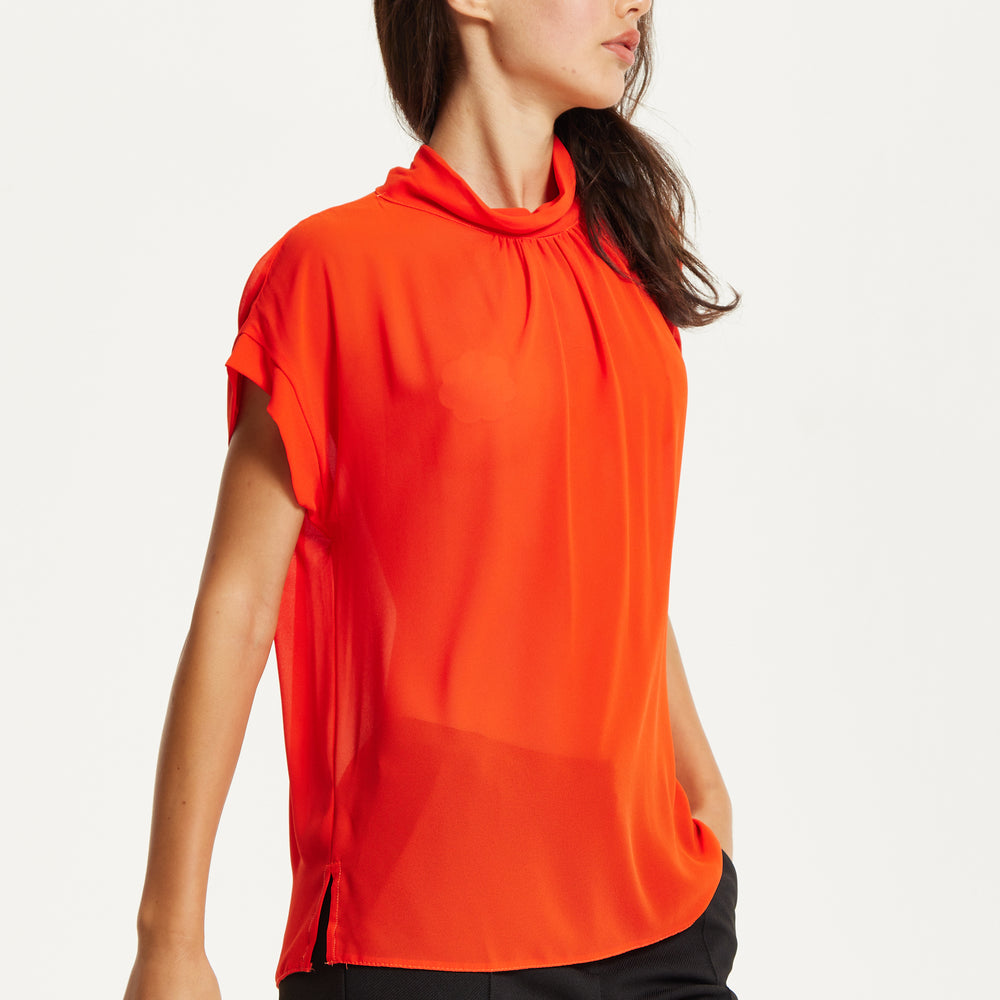 
                  
                    Orange High Neck Tie Back Top
                  
                