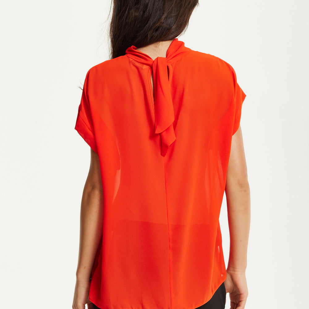 
                  
                    Orange High Neck Tie Back Top
                  
                