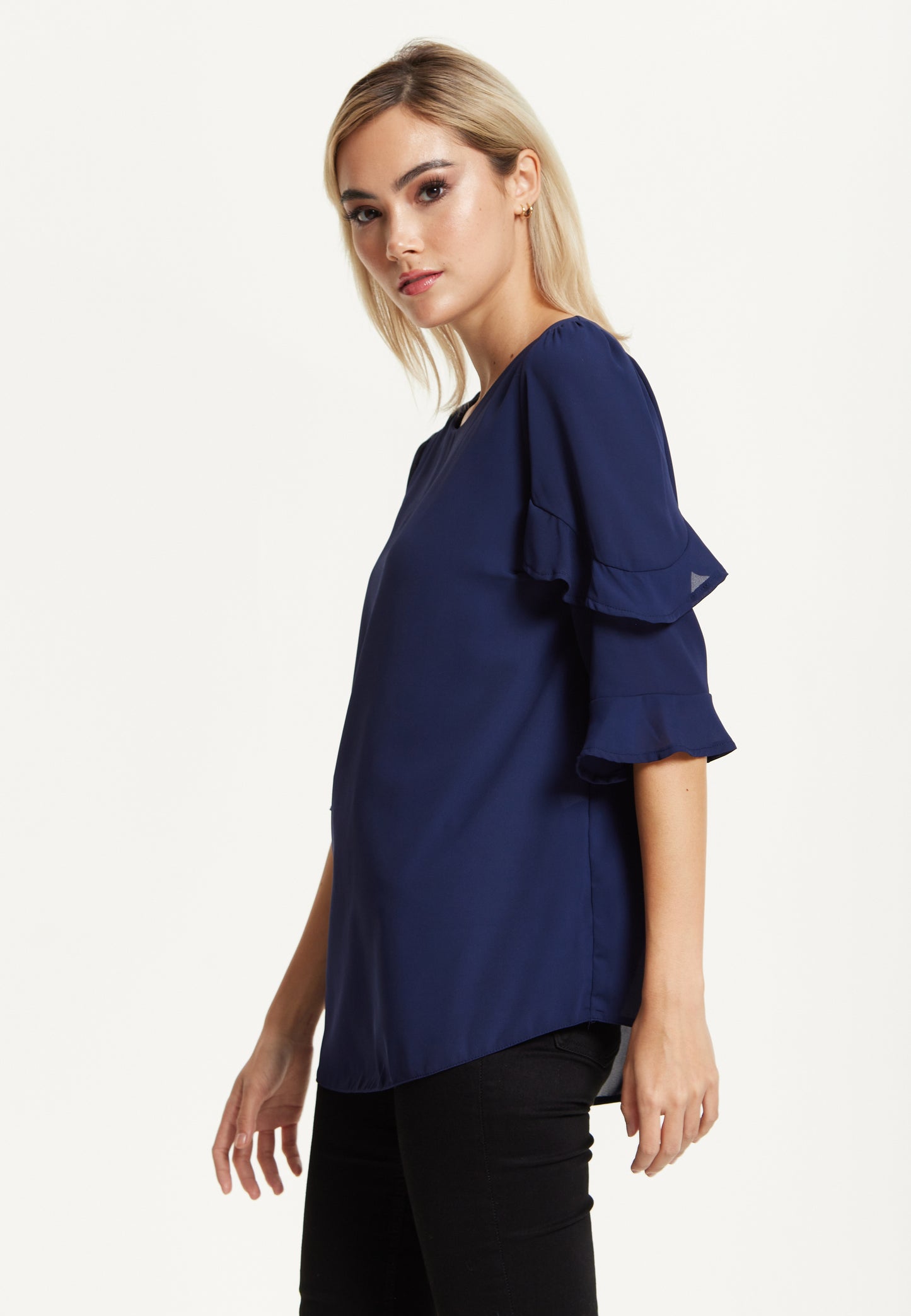 
                  
                    Navy Ruffle Sleeve Blouse
                  
                