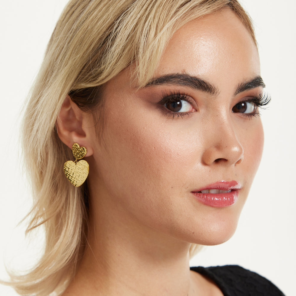 
                  
                    Gold Textured Double Heart Earrings
                  
                