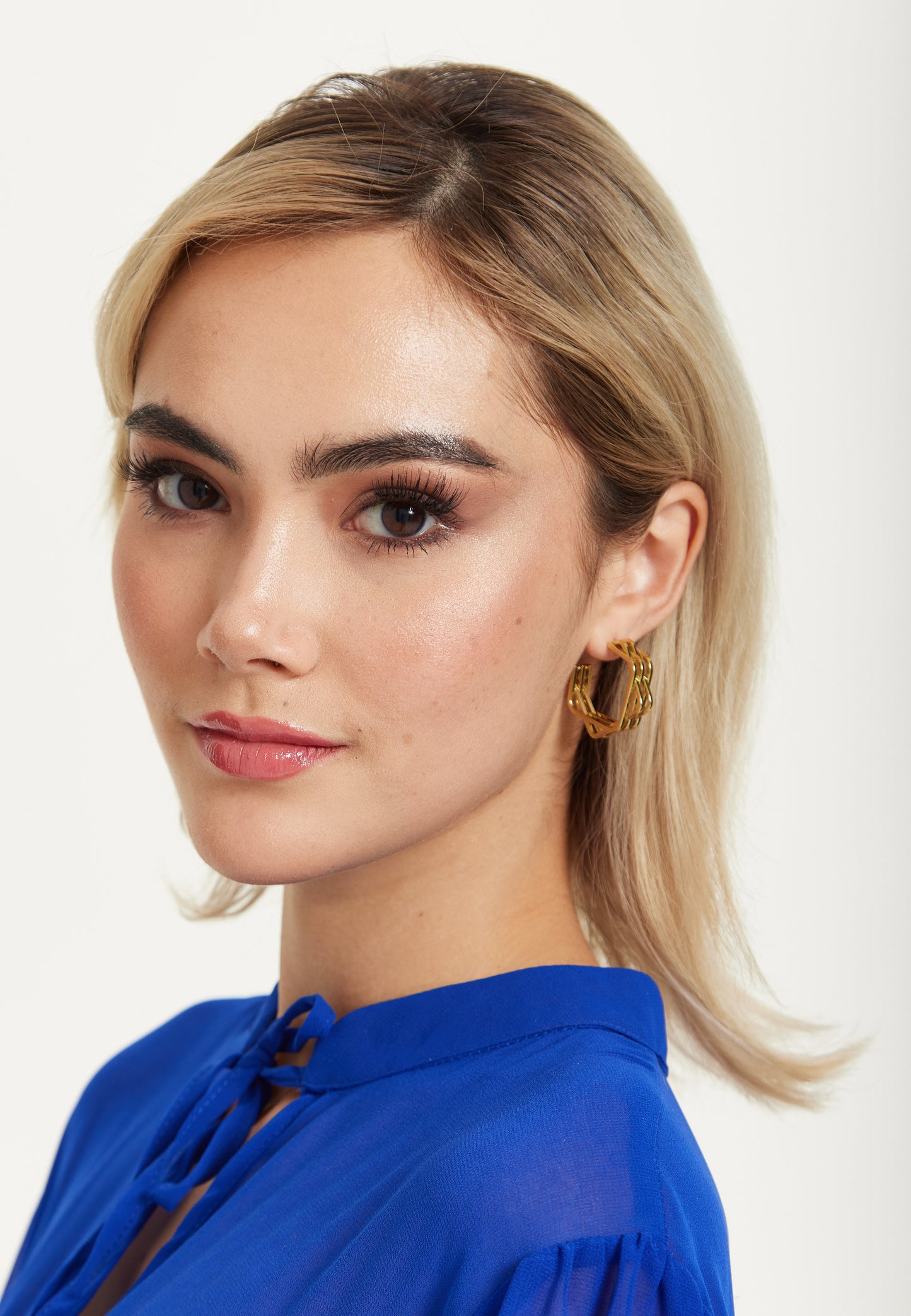 
                  
                    Gold Geometric Layered Hoop Earrings
                  
                