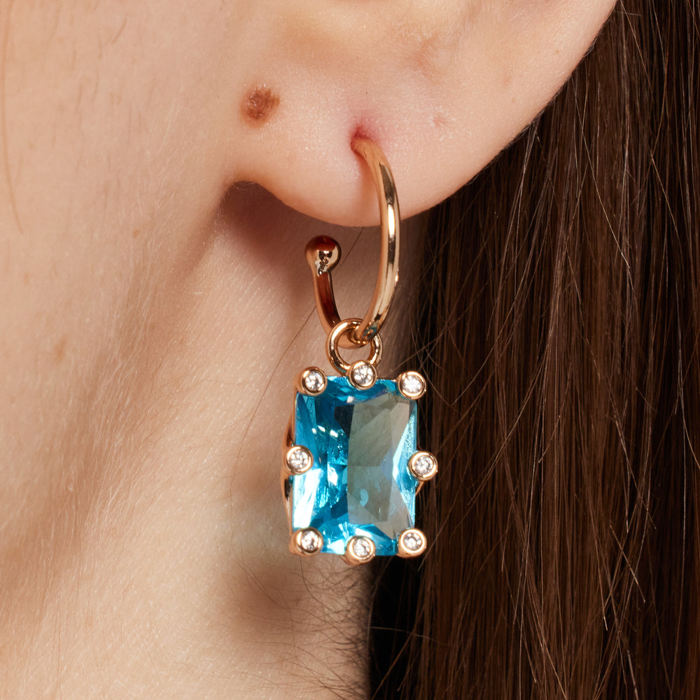 
                  
                    Sky-Blue Baguette Huggie Drop Earrings in Gold
                  
                