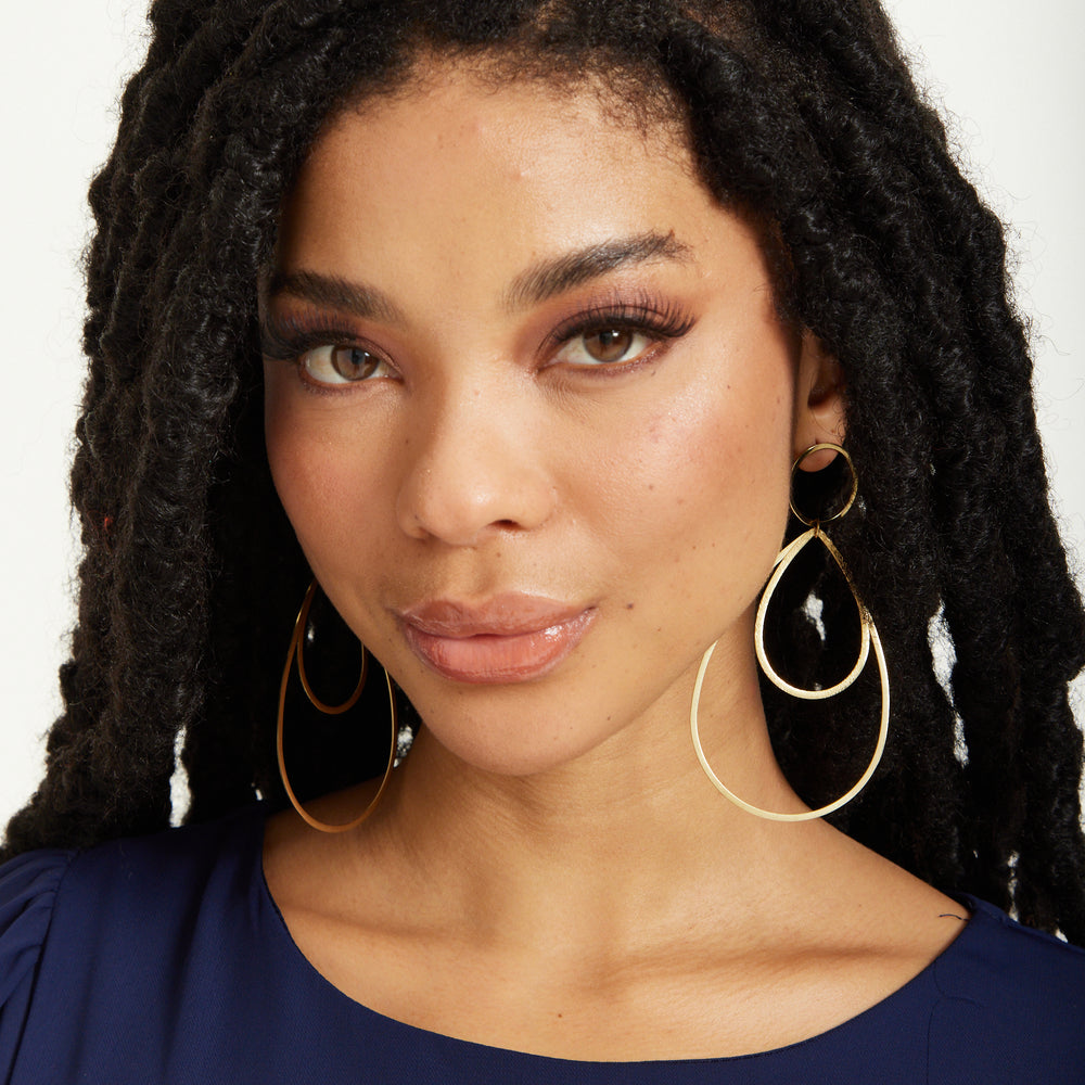 
                  
                    Gold Double Teardrop Statement Earrings
                  
                