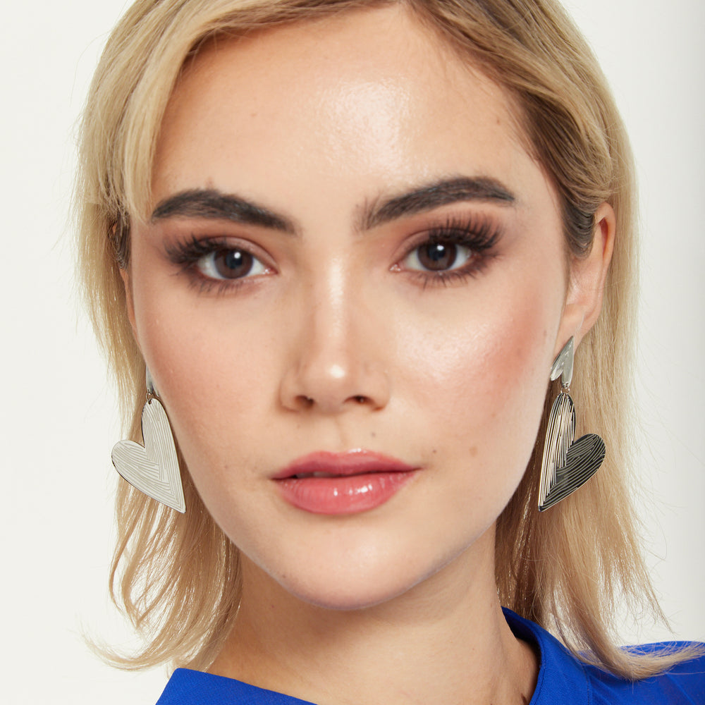 
                  
                    Silver Textured Double Heart Earrings
                  
                