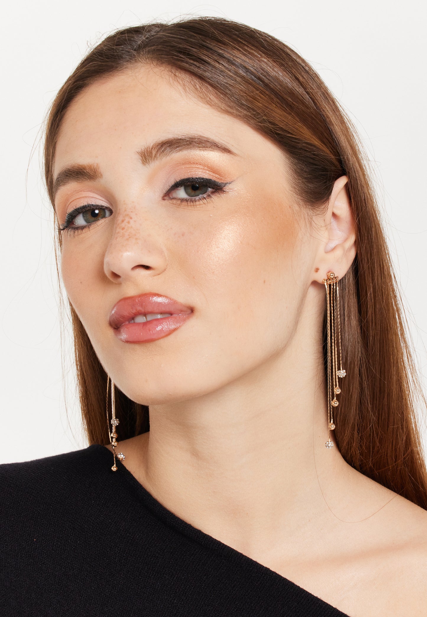 
                  
                    Gold Tassel Earrings with Rhinestone
                  
                