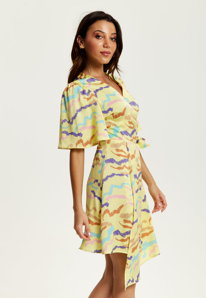 Liquorish Mini Abstract Print Wrap Dress In Yellow