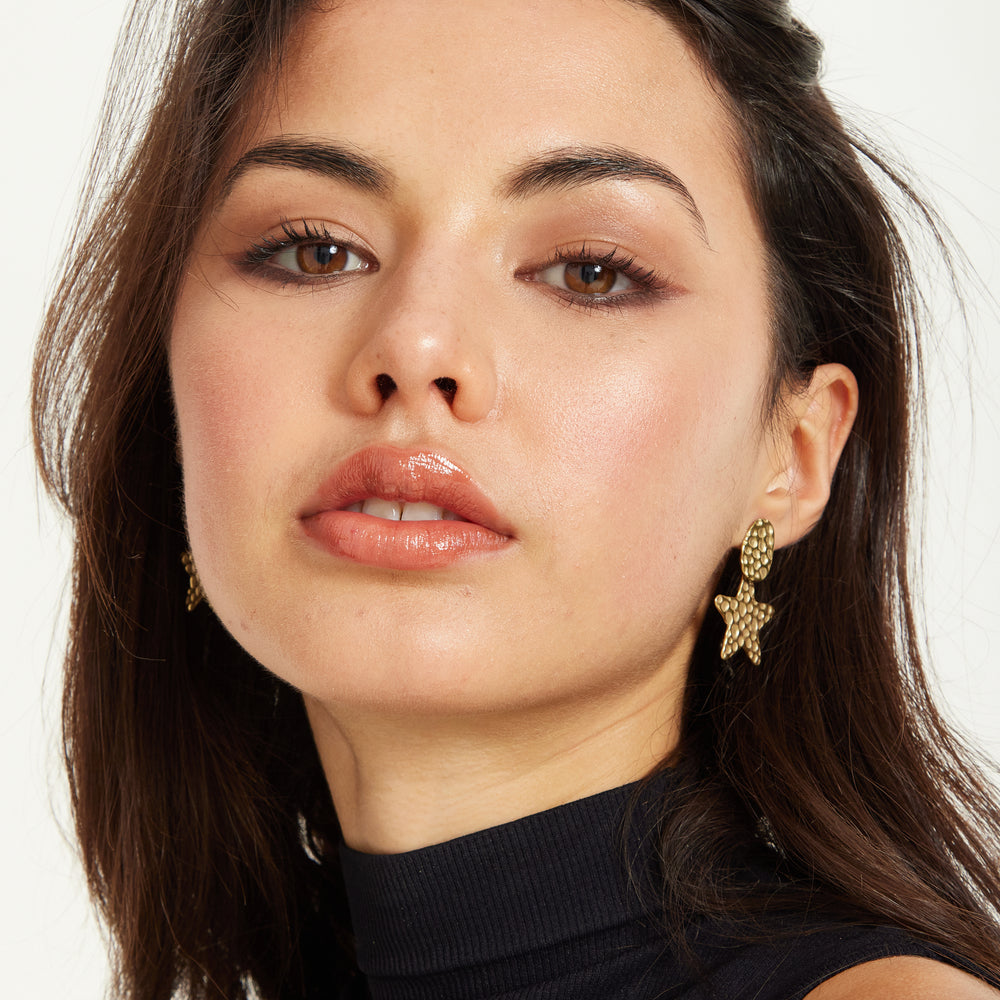 
                  
                    Gold Hammered Star Drop Earrings
                  
                