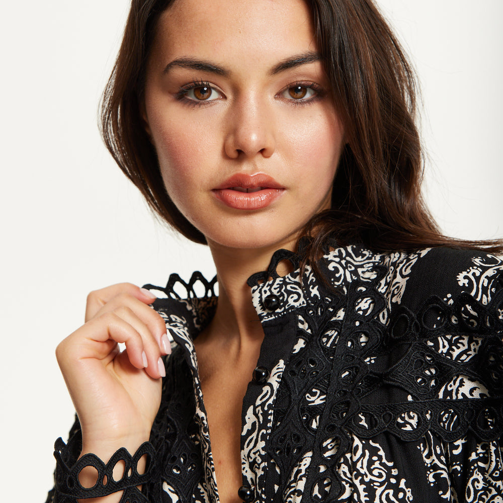 
                  
                    Black Embroidered Lace Mini Dress
                  
                
