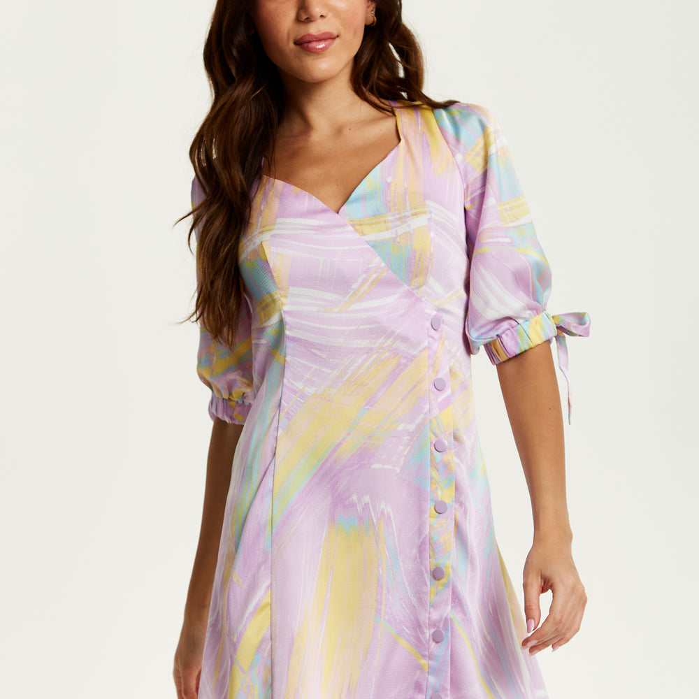 
                  
                    Liquorish Mini Abstract Brush Stroke Print Dress With V Neck, Tie Back And Tie Sleeves In Lilac
                  
                