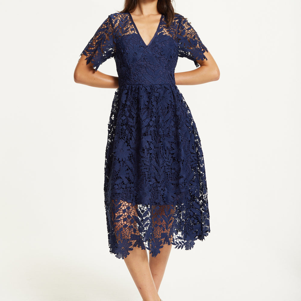 
                  
                    FLARE LACE MIDI DRESS IN NAVY
                  
                