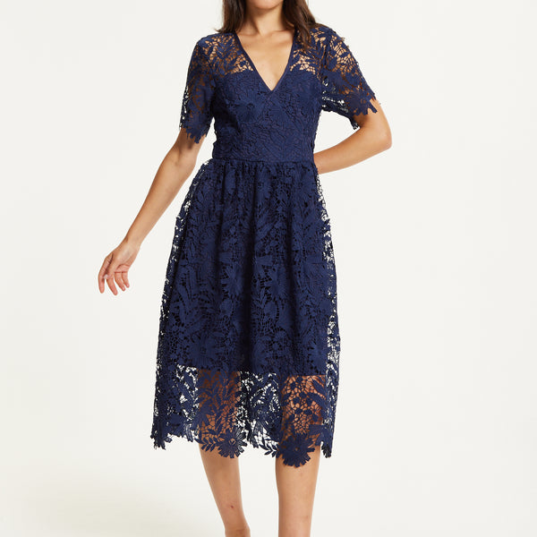 FLARE LACE MIDI DRESS IN NAVY