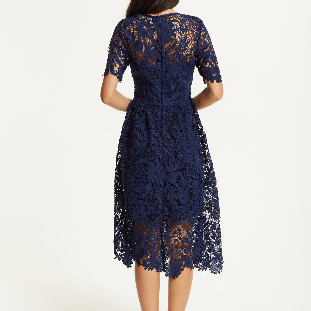 
                  
                    FLARE LACE MIDI DRESS IN NAVY
                  
                