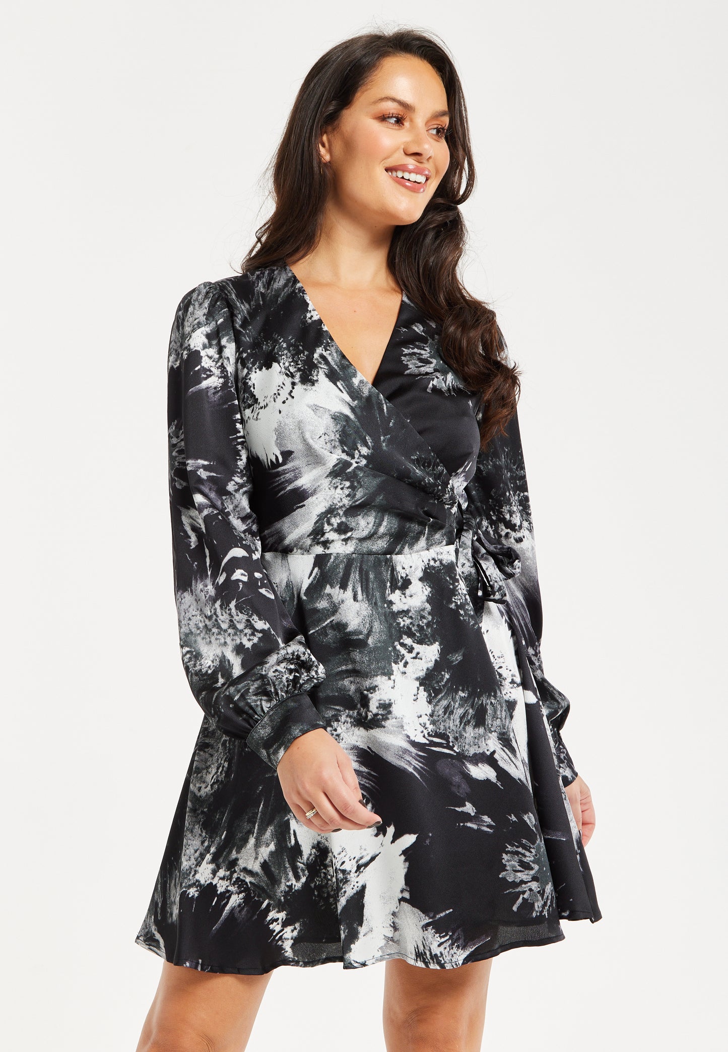 
                  
                    Women's Mini Dress in Eye-Catching Mono Abstract Print, Flattering Wrap Style, Long Sleeves - Liquorish
                  
                