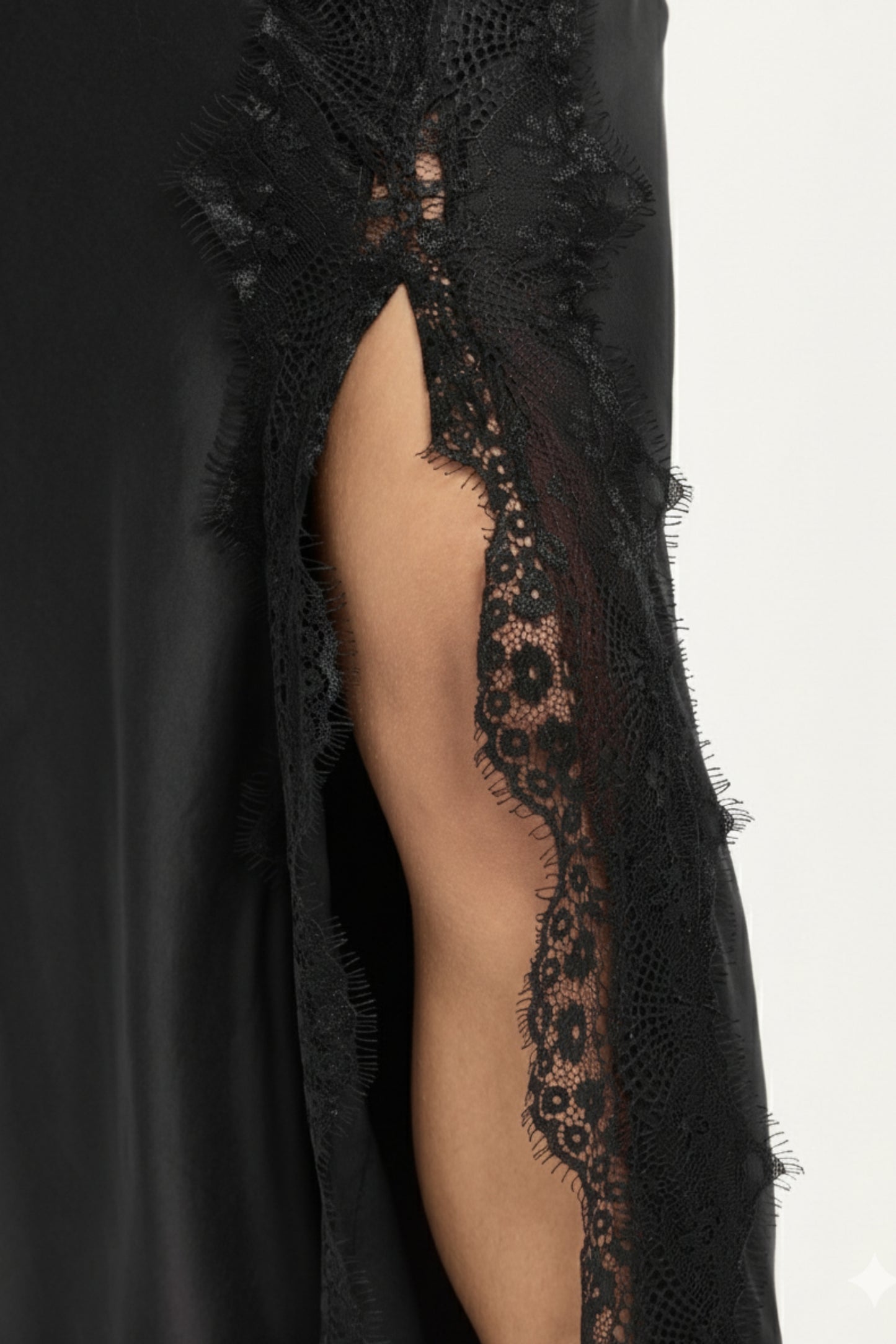 
                  
                    Black Satin Midi Skirt With Lace Trim
                  
                