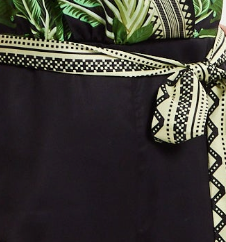 
                  
                    Liquorish Leaf Printed V-neck Jumpsuit With Tie Detail
                  
                