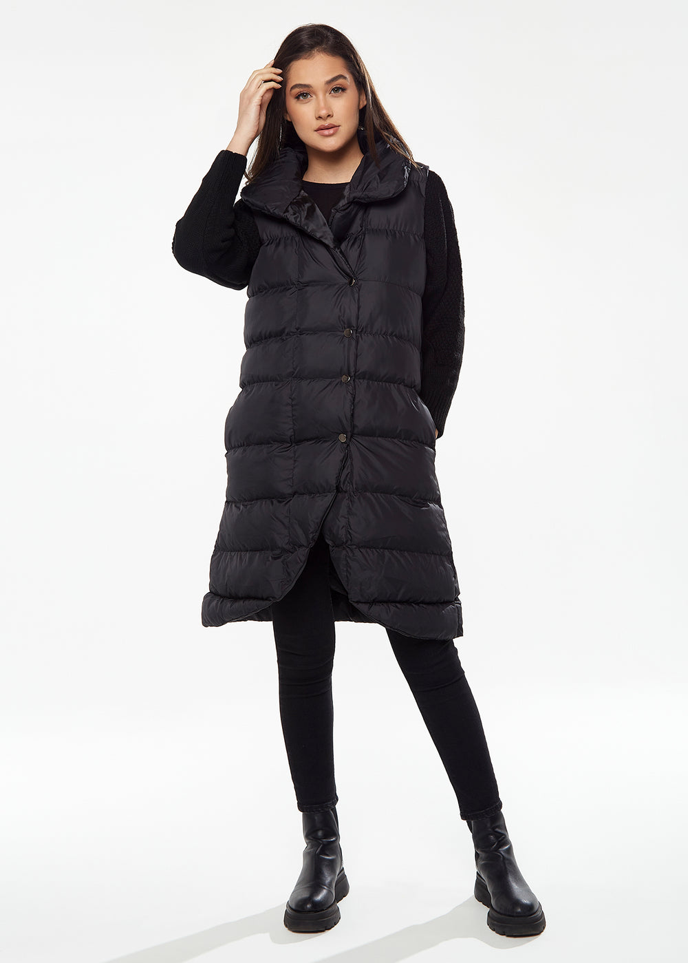 Women's Long Black Puffer Gilet with Asymmetric Button Closure, Drawstring High Neck, and Side Pockets for Ultimate Warmth
