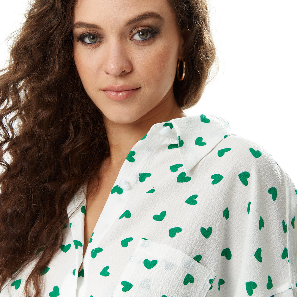 
                  
                    Liquorish Green Heart Print Shirt in White
                  
                