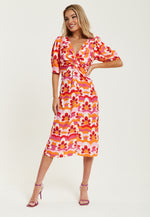 Liquorish Floral Knot Front Midi Dress in Orange and Pink