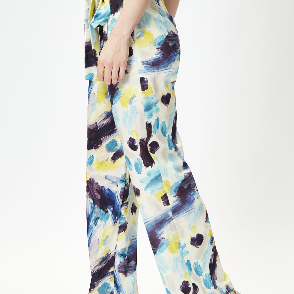 
                  
                    Liquorish Multicolour Abstract print trousers with matching tie waist
                  
                