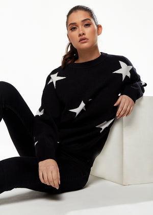 Black and discount white star sweater