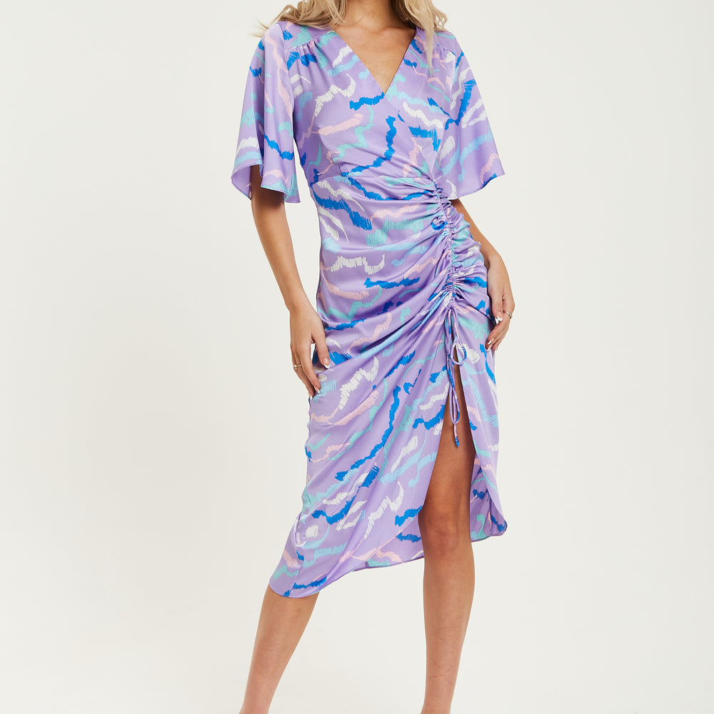 
                  
                    Liquorish Midi Wrap Dress With Abstract Zebra Print in Lilac
                  
                