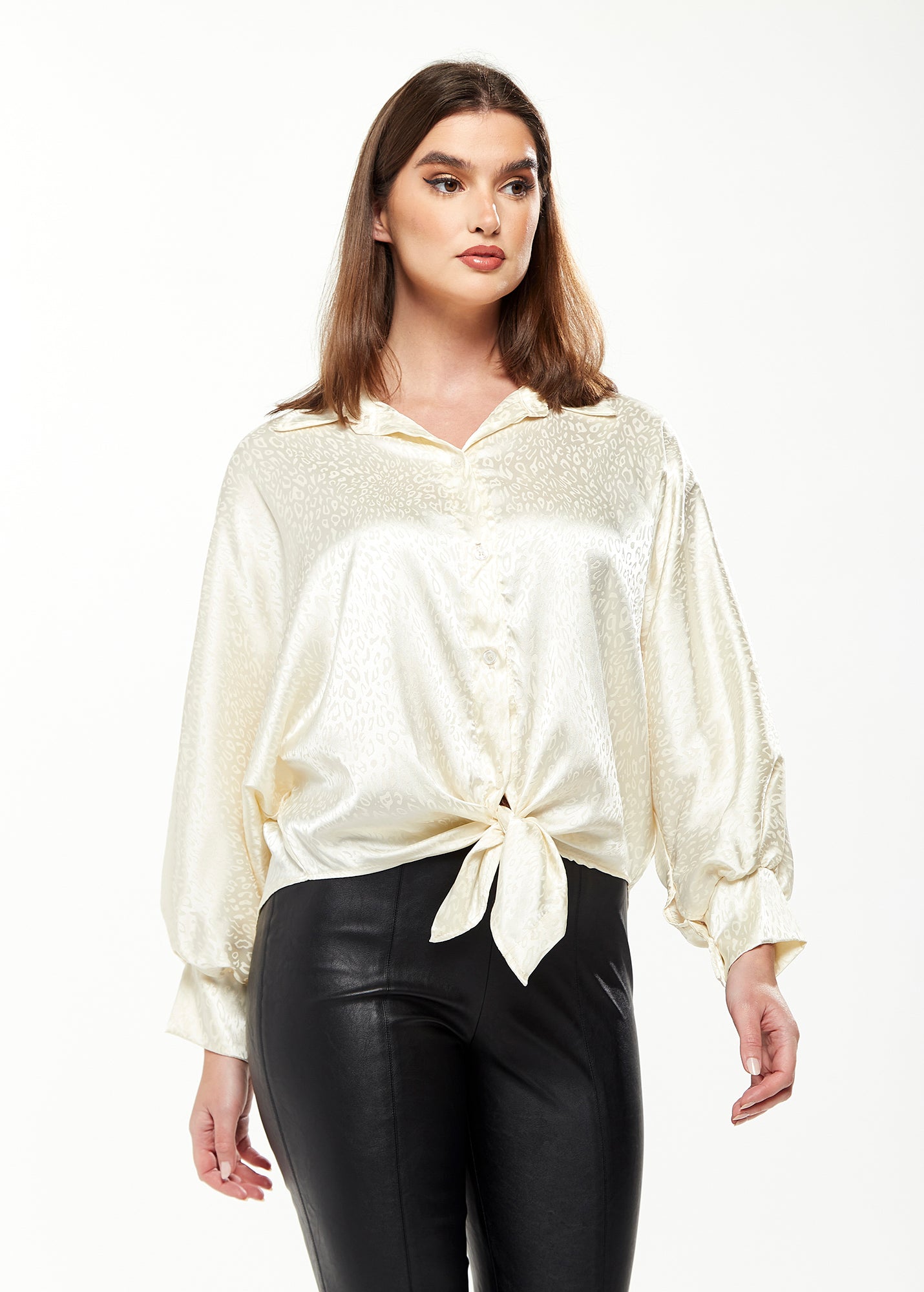 
                  
                    Divine Grace Leopard Jacquard Blouse with Front Waist Tie in Off White
                  
                