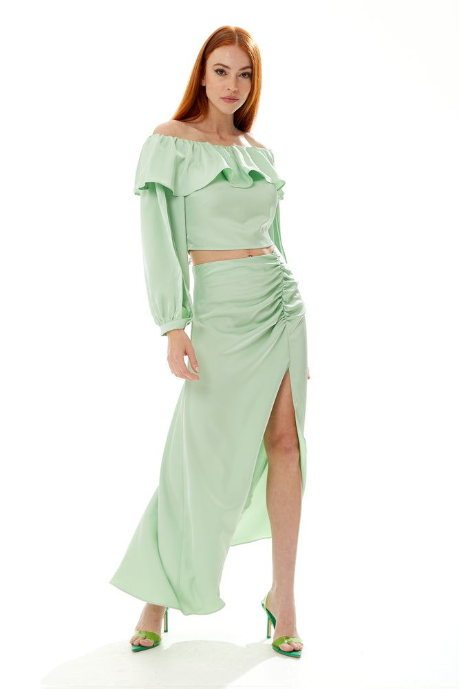 Liquorish ruffle long sleeve off the shoulder top with sleeve slits in mint green