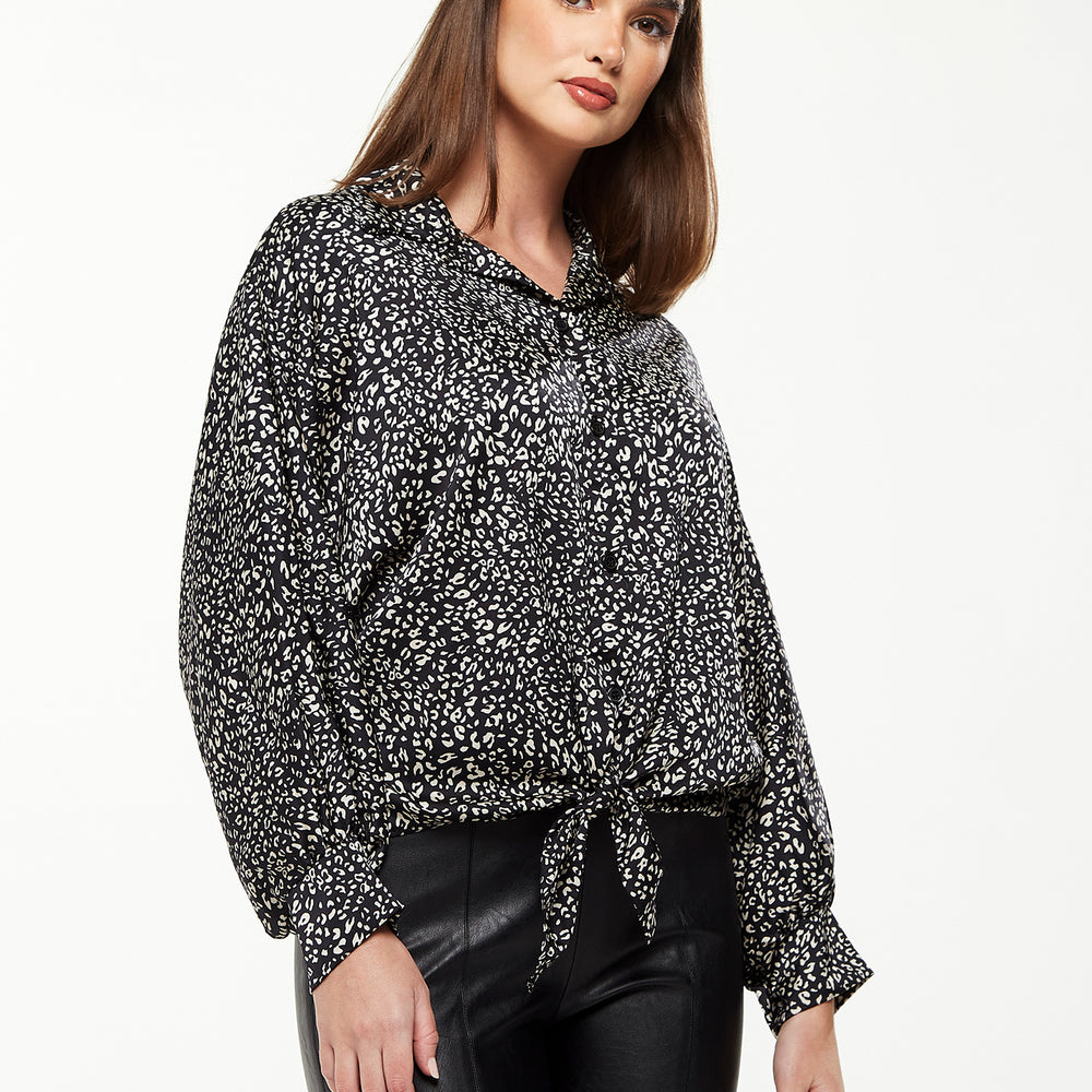 
                  
                    Divine Grace Blouse with Front Tie in Black & White Animal Print
                  
                