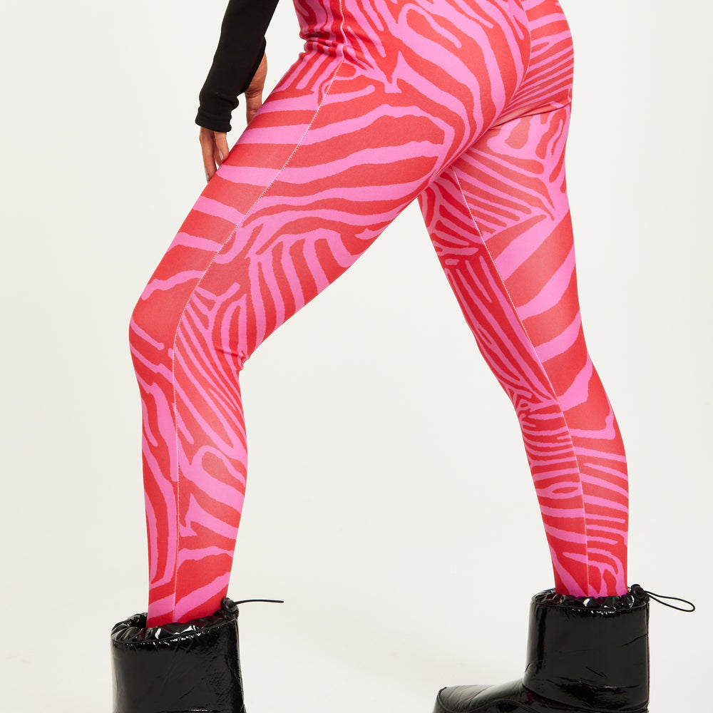 
                  
                    Liquorish Ski Base Layer Tights In Pink Zebra Print
                  
                