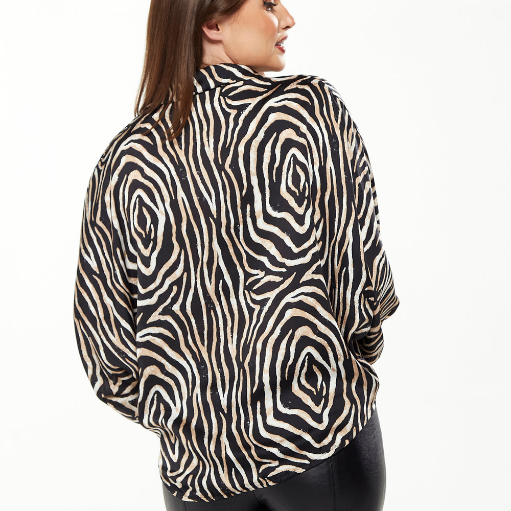 
                  
                    Divine Grace Blouse with Front Waist Tie in Zebra Print
                  
                
